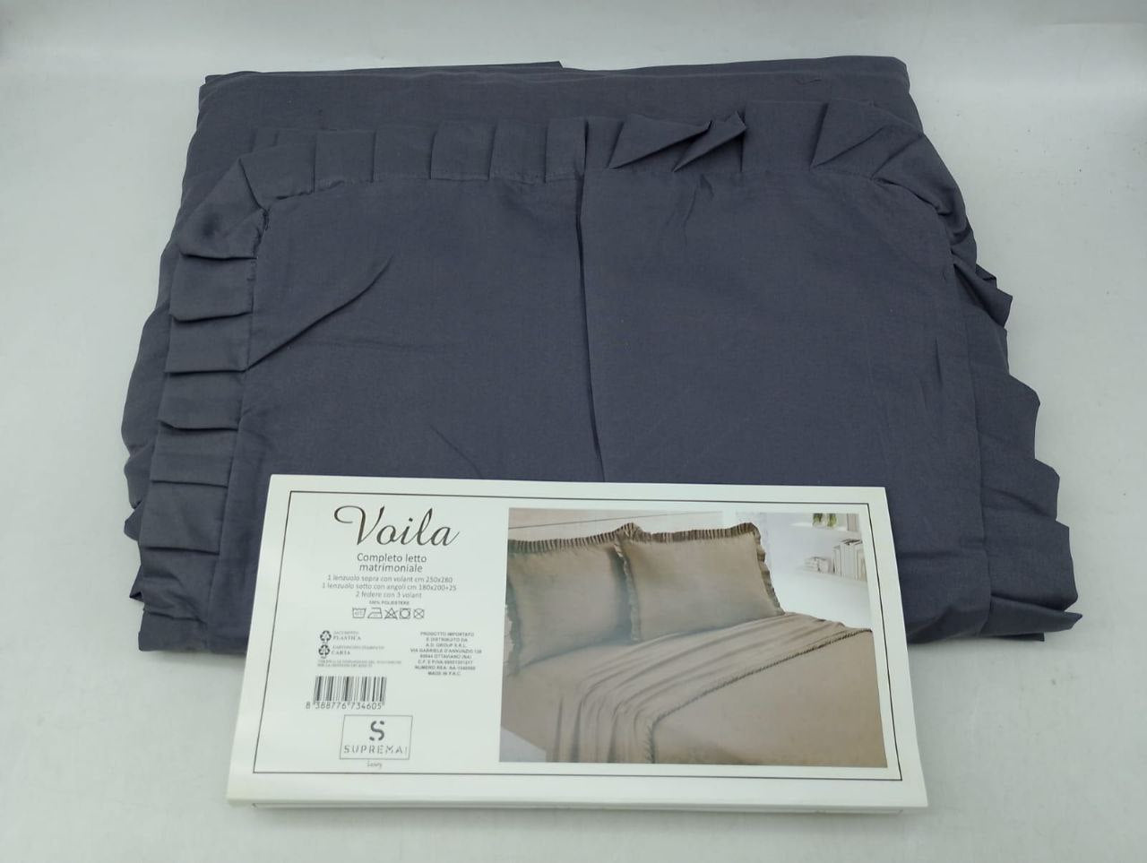 Lenzuola tinta unita con rouche