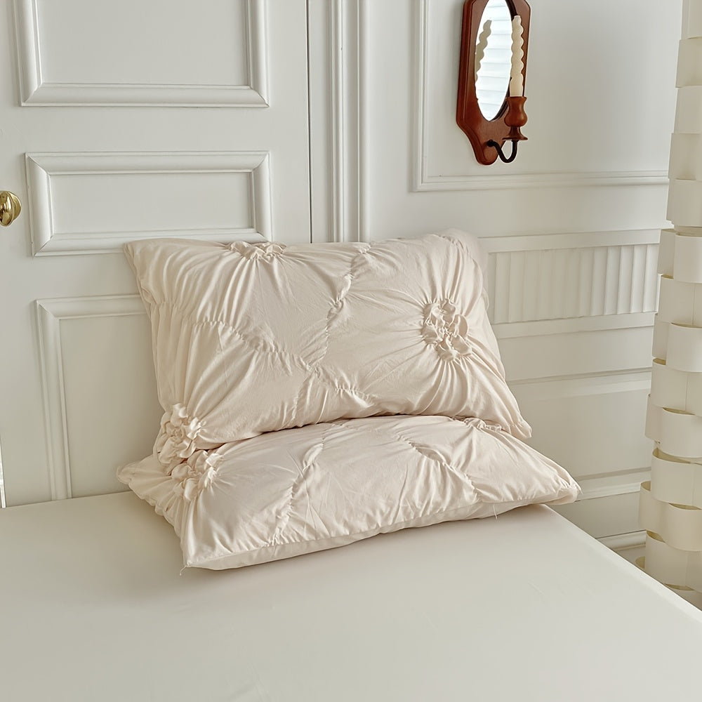 Copripiumino beige con fiori tridimensionali