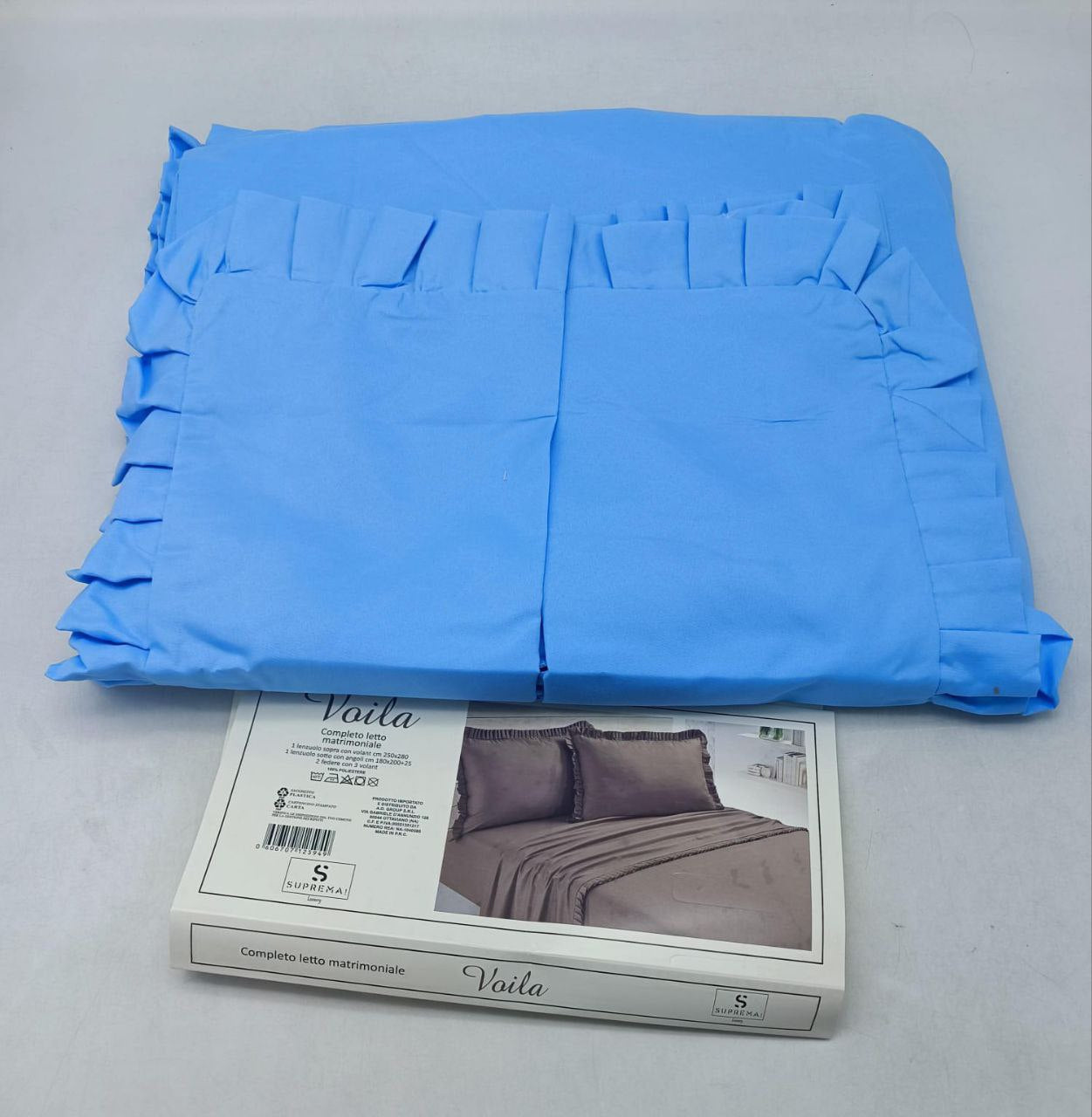 Lenzuola tinta unita con rouche