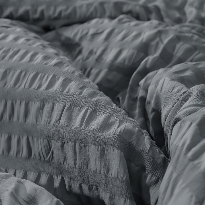 Set Copripiumino e federa con righe in rilievo in garza di schiuma