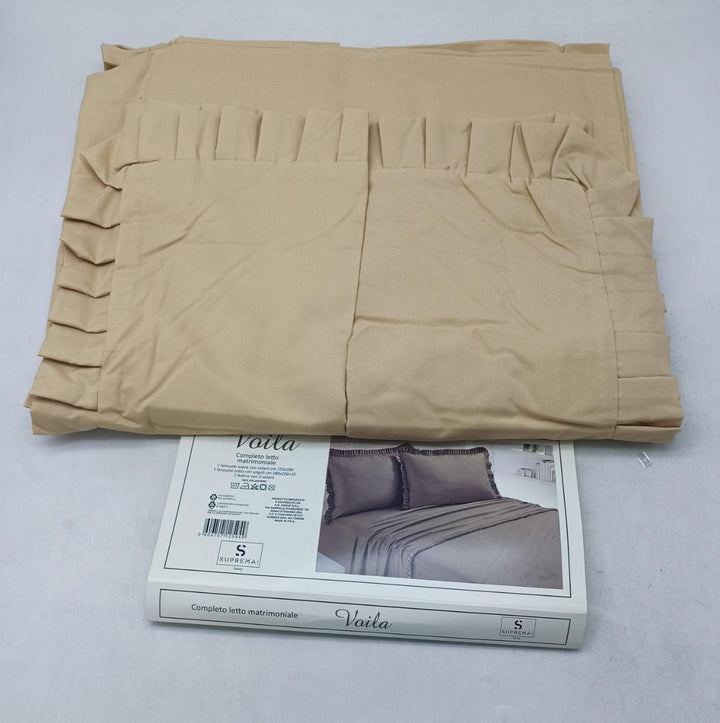 Lenzuola tinta unita con rouche