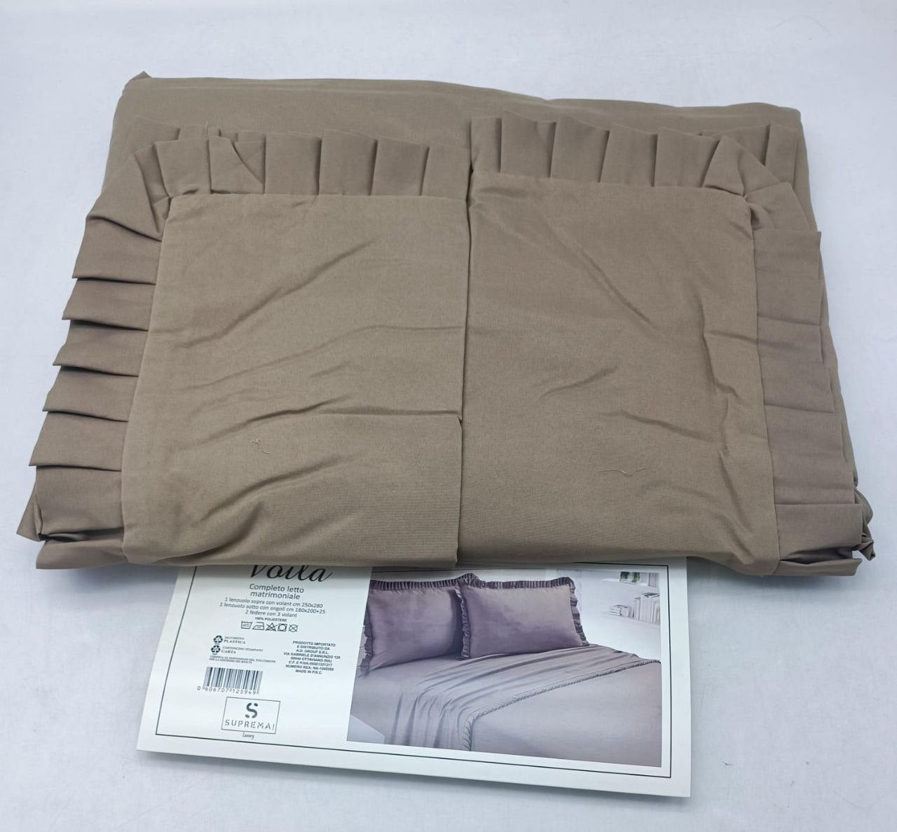 Lenzuola tinta unita con rouche