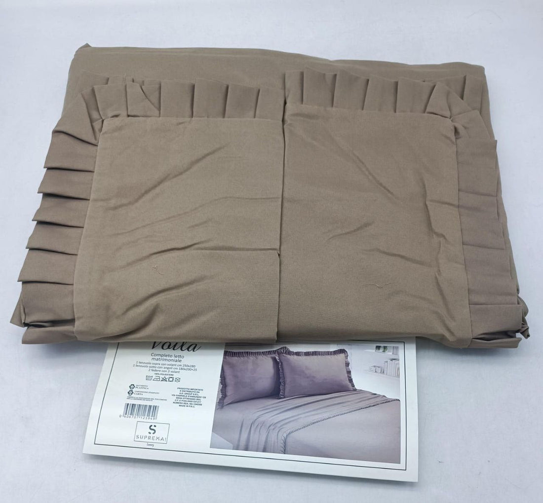 Lenzuola tinta unita con rouche