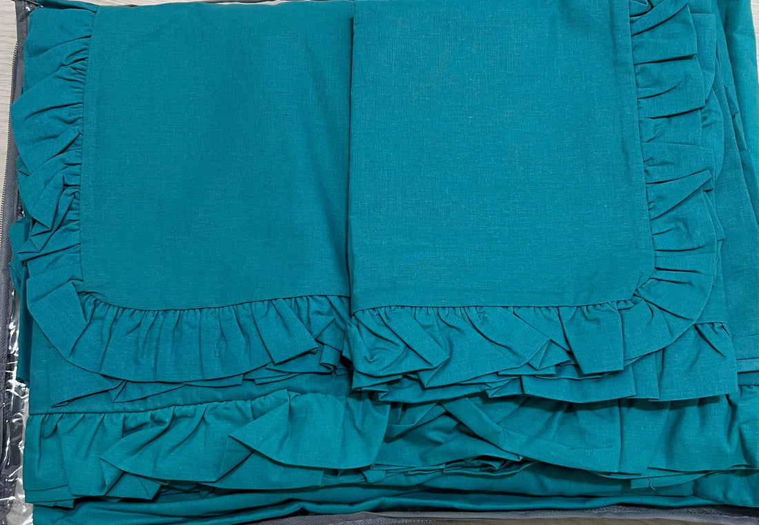 Lenzuola tinta unita con rouche