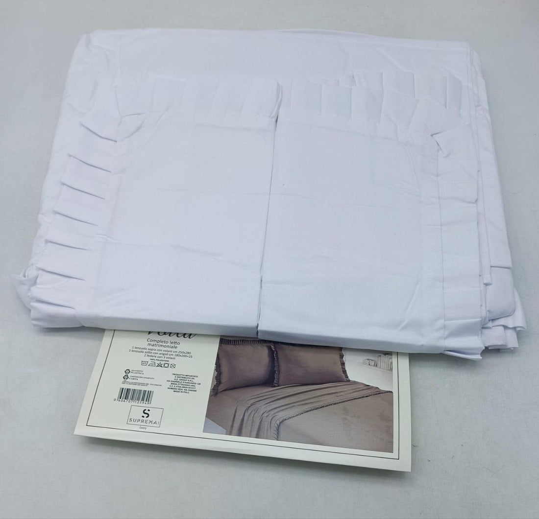 Lenzuola tinta unita con rouche