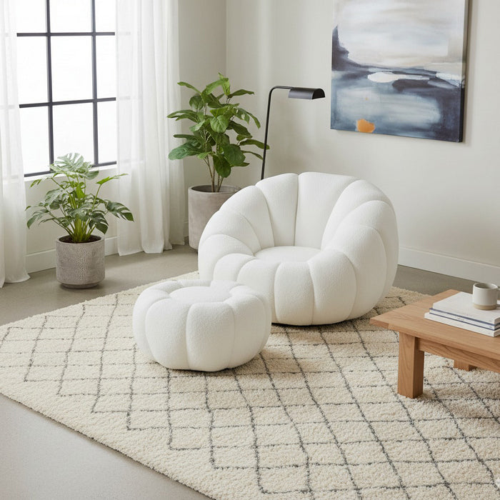 Set poltrona girevole con pouf poggiapiedi in tessuto bouclè - Nuvola